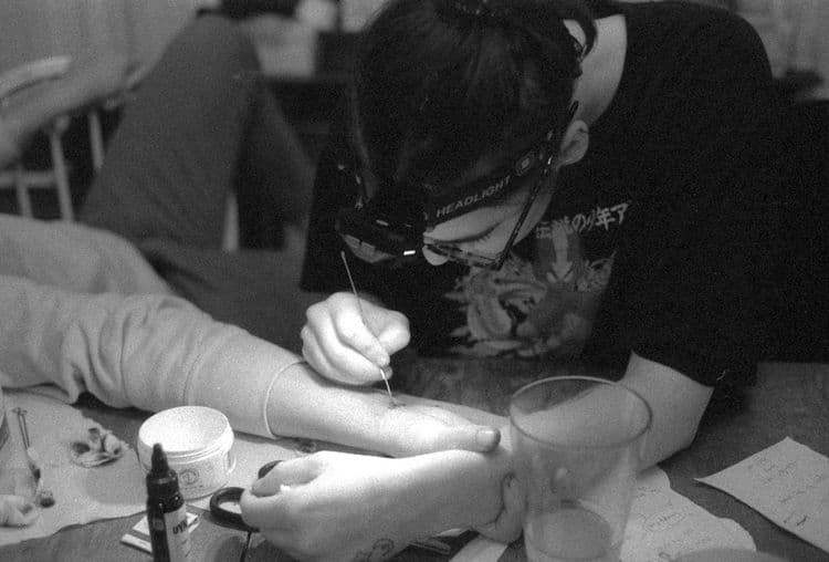 Nail Pros Compete for Scratch Stars in Practical Judging
