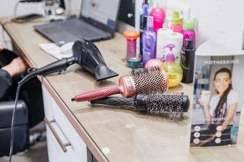 Drag Queen's Experience Fuels Inclusive Salon Model